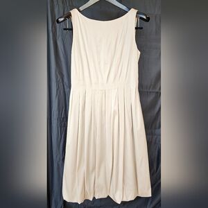 Elegant Cream Sleeveless Lined Subtle Bubble Hem Dress
